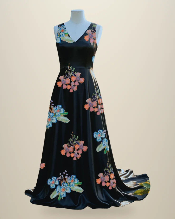 Black satin evening gown with a train, printed with coral and blue floral bouquets